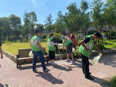星火村开展社区清洁志愿者服务活动